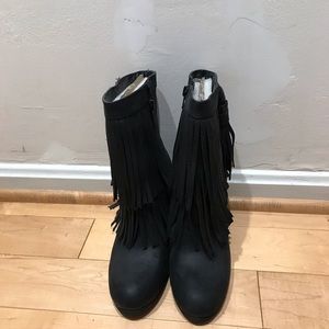 New black fringe Thread Supply booties.